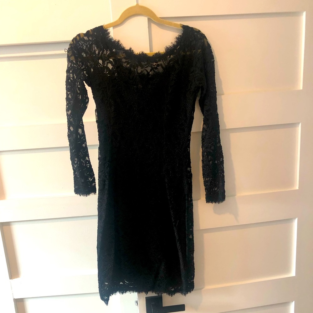 Black cocktail dress with lace sleeves